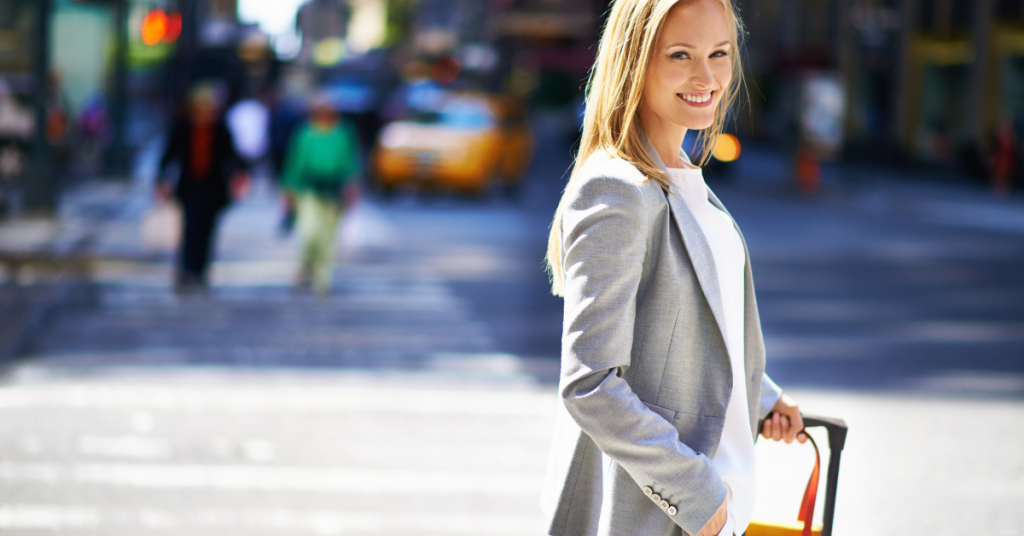 A woman walks down the street in New York.